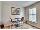 Cozy breakfast nook featuring wood floors and a window for natural light with modern chairs and dark table at 2312 Wayside Ne Dr, Brookhaven, GA 30319
