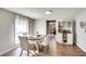 Well-lit dining room area featuring light colored walls and wood floors at 2312 Wayside Ne Dr, Brookhaven, GA 30319