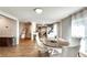 Dining room with wood floors looking towards kitchen and other living areas at 2312 Wayside Ne Dr, Brookhaven, GA 30319