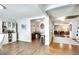 Dining room with wood floors leading to living room at 2312 Wayside Ne Dr, Brookhaven, GA 30319