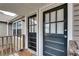 Entryway with two black doors with windows and a view of the side of the home at 2312 Wayside Ne Dr, Brookhaven, GA 30319