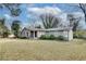 Single-story home featuring mature landscaping and a well-maintained yard at 2312 Wayside Ne Dr, Brookhaven, GA 30319