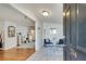 Light-filled foyer featuring tile floors, seating area, and access to living spaces at 2312 Wayside Ne Dr, Brookhaven, GA 30319