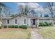 Inviting single-story home featuring manicured front yard and a classic facade at 2312 Wayside Ne Dr, Brookhaven, GA 30319