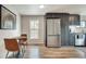 Kitchen featuring stainless steel appliances, sleek gray cabinetry, and a cozy breakfast nook at 2312 Wayside Ne Dr, Brookhaven, GA 30319
