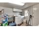 Bright laundry room with washer, dryer and storage cabinets at 2312 Wayside Ne Dr, Brookhaven, GA 30319