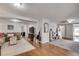 Open-concept living room with hardwood floors and seamless flow to other spaces at 2312 Wayside Ne Dr, Brookhaven, GA 30319