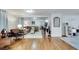 Spacious living room with hardwood floors, ample seating, and stylish decor at 2312 Wayside Ne Dr, Brookhaven, GA 30319