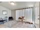 Cozy seating area with natural light, tile flooring, and access to the outdoors at 2312 Wayside Ne Dr, Brookhaven, GA 30319