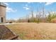 Expansive backyard featuring mature trees, a patio, and outdoor space at 4808 Albany Way, Atlanta, GA 30331