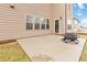 Spacious backyard with a concrete patio and outdoor fire pit at 4808 Albany Way, Atlanta, GA 30331