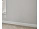 A bright, neutral bedroom with a large window and carpeted floors at 4808 Albany Way, Atlanta, GA 30331