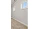 Bedroom featuring neutral carpet, large windows, and white trim at 4808 Albany Way, Atlanta, GA 30331