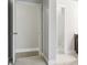 Bright hallway featuring neutral paint, white trim, and doors at 4808 Albany Way, Atlanta, GA 30331