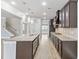 Kitchen with dark cabinets, granite counters, and a large island perfect for entertaining at 4808 Albany Way, Atlanta, GA 30331