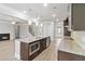 Kitchen featuring granite counters, stainless appliances, and a large island with bar seating at 4808 Albany Way, Atlanta, GA 30331