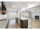 Gourmet kitchen with granite countertops, stainless steel appliances, a large island with bar seating at 4808 Albany Way, Atlanta, GA 30331