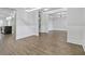 Spacious living area featuring hardwood floors, neutral paint, and decorative trim work at 4808 Albany Way, Atlanta, GA 30331