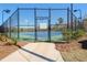 Community tennis court with well-maintained surface and surrounding landscape at 4808 Albany Way, Atlanta, GA 30331