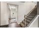 Inviting entryway featuring hardwood floors, staircase, and a welcoming front door at 174 Silver Leaf Trl, Douglasville, GA 30134