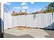 This backyard features a concrete patio and a privacy fence with greenery growing on it at 102 Johnson Ct, Decatur, GA 30030