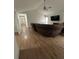 Spacious living room with hardwood floors and a comfortable sofa at 10936 Station Dr, Hampton, GA 30228