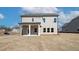 Rear exterior of a home featuring a covered patio at 4433 Eastbrook Pl, Snellville, GA 30039