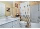 Clean bathroom with a shower-tub combination and a decorative shower curtain at 2160 Berryhill Se Cir, Smyrna, GA 30082