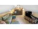 Spacious bonus room with a comfortable sofa, television, and ample storage at 2160 Berryhill Se Cir, Smyrna, GA 30082