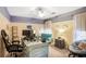 Well-lit home office with a large desk, comfortable seating, and ample workspace at 2160 Berryhill Se Cir, Smyrna, GA 30082