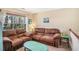 Cozy living room featuring comfortable sofas and a serene view of the outdoors at 2160 Berryhill Se Cir, Smyrna, GA 30082