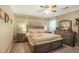 This main bedroom offers neutral paint, a ceiling fan, and molding detail at 2160 Berryhill Se Cir, Smyrna, GA 30082