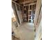 Framed-out portion of unfinished basement with plumbing access, new construction at 2515 Hogan Rd, East Point, GA 30344