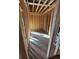 A bedroom is being constructed with bare wood studs and a plywood subfloor at 2515 Hogan Rd, East Point, GA 30344