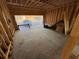 Unfinished garage framing with an opening for the garage door at 2515 Hogan Rd, East Point, GA 30344