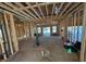 Unfinished construction of a living room with sliding doors leading to a patio at 2515 Hogan Rd, East Point, GA 30344