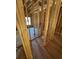 The living room is being constructed with bare wood studs, a subfloor, and a window at 2515 Hogan Rd, East Point, GA 30344