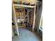 Framed-out bathroom with plumbing for toilet and sink, new construction at 2515 Hogan Rd, East Point, GA 30344
