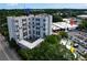 Aerial view of the high-rise apartment building and nearby Trader Joe's at 587 Virginia Ne Ave # 315, Atlanta, GA 30306