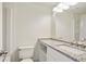 Bathroom featuring granite countertops, a modern vanity, and a shower with white tile surround at 587 Virginia Ne Ave # 315, Atlanta, GA 30306
