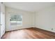Bright bedroom with hard wood floors and a sliding glass window at 587 Virginia Ne Ave # 315, Atlanta, GA 30306