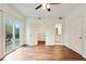 Large bedroom with hard wood floors and a sliding glass door at 587 Virginia Ne Ave # 315, Atlanta, GA 30306