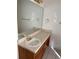 Bathroom featuring a large mirror, granite counters, and vanity at 12264 Crestwood Ct, Fayetteville, GA 30215