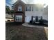 Charming two-story home features a brick and vinyl facade, well-maintained lawn, and inviting curb appeal at 12264 Crestwood Ct, Fayetteville, GA 30215
