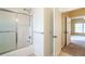 Bathroom with shower/tub combo adjacent to bedroom at 550 Oak Ridge Dr, Oxford, GA 30054
