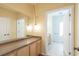 Bathroom featuring spacious countertop and an adjoining room at 550 Oak Ridge Dr, Oxford, GA 30054