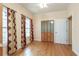 Bedroom with hardwood floors, a ceiling fan, and a closet at 550 Oak Ridge Dr, Oxford, GA 30054
