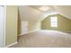 Bonus room offering neutral carpet and a large window at 550 Oak Ridge Dr, Oxford, GA 30054