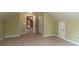 Bonus room offers flexible space, neutral carpet, and access to multiple rooms at 550 Oak Ridge Dr, Oxford, GA 30054