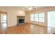 Living room featuring a stone fireplace and hardwood floors at 550 Oak Ridge Dr, Oxford, GA 30054